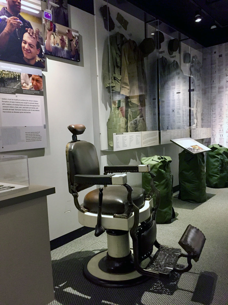 A barber's chair as part of an exhibit inside the US Army Basic Combat Training Museum.